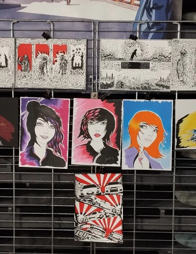 Photo de l'exposition des travaux de l'artiste-dessinateur "Bicourt Yoan" lors du salon du livre de Péronne de 2024.